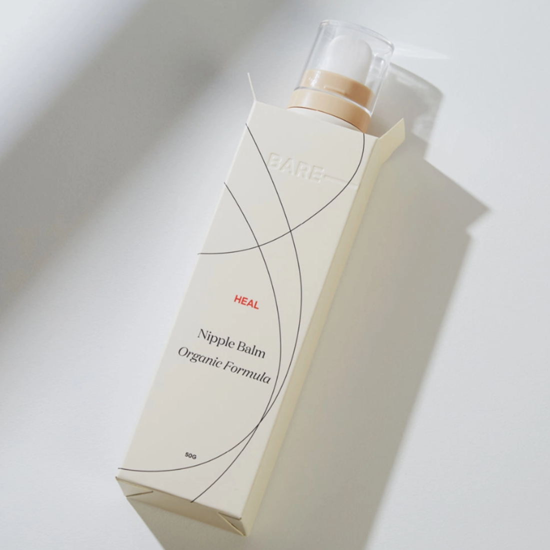 Marigold HEAL restorative nipple balm with ceramic applicator for soothing, protecting, and nourishing breastfeeding skin