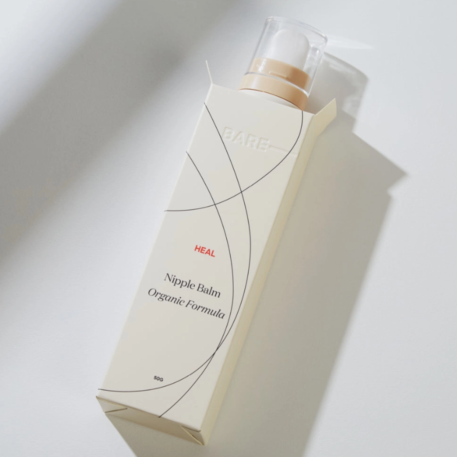 Marigold HEAL restorative nipple balm with ceramic applicator for soothing, protecting, and nourishing breastfeeding skin