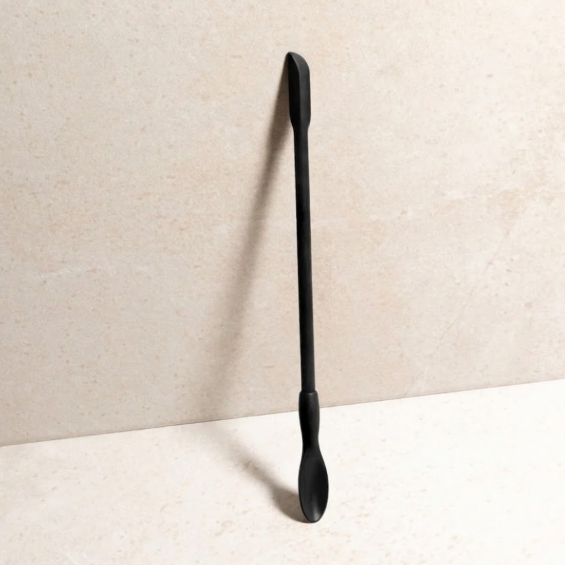 Flexible silicone Last Drop Scoop spatula set designed to retrieve remaining serum, moisturizer, and foundation from bottles and jars for zero-waste skincare use