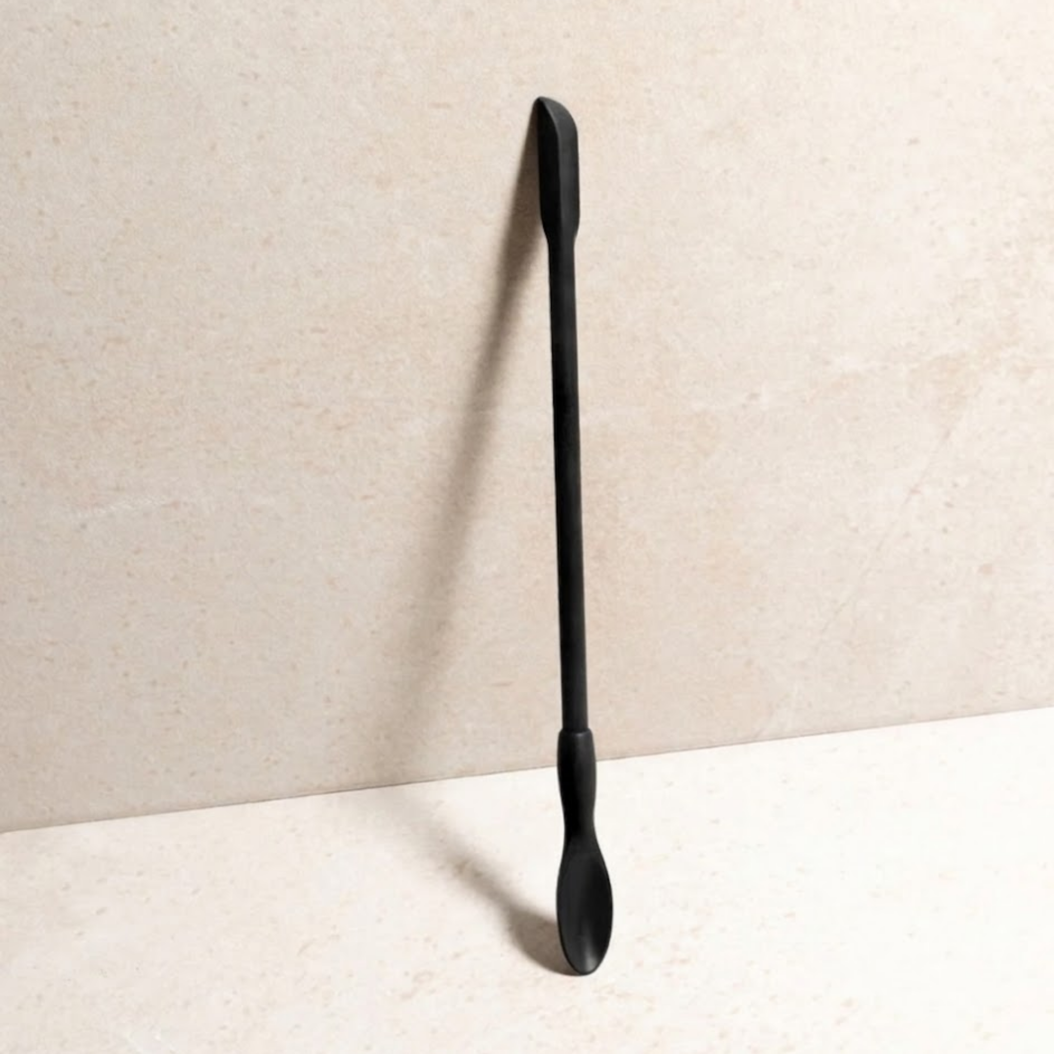 Flexible silicone Last Drop Scoop spatula set designed to retrieve remaining serum, moisturizer, and foundation from bottles and jars for zero-waste skincare use