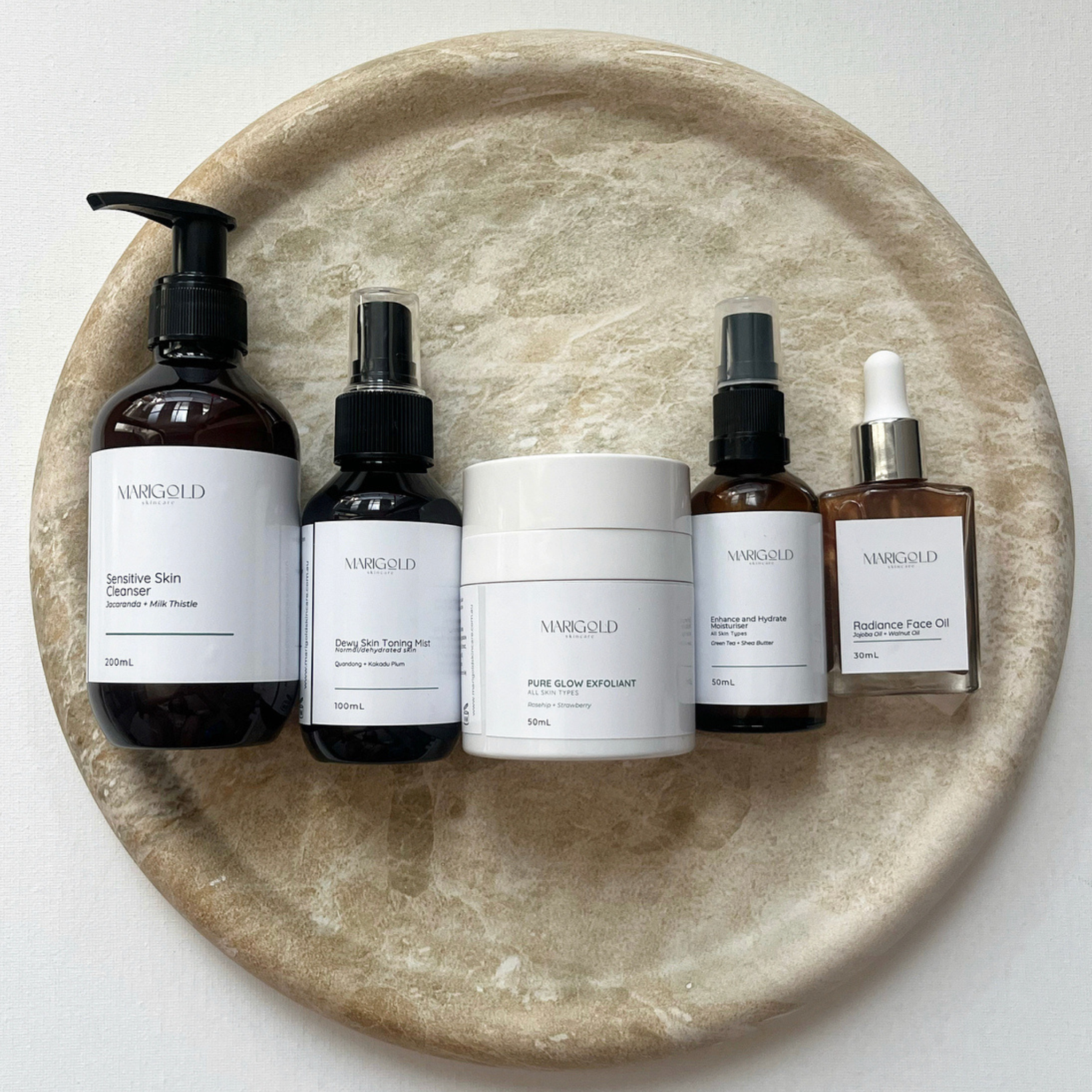 Soothing sensitive skin care package with gentle cleanser, hydrating treatment, and calming products for soft, healthy skin